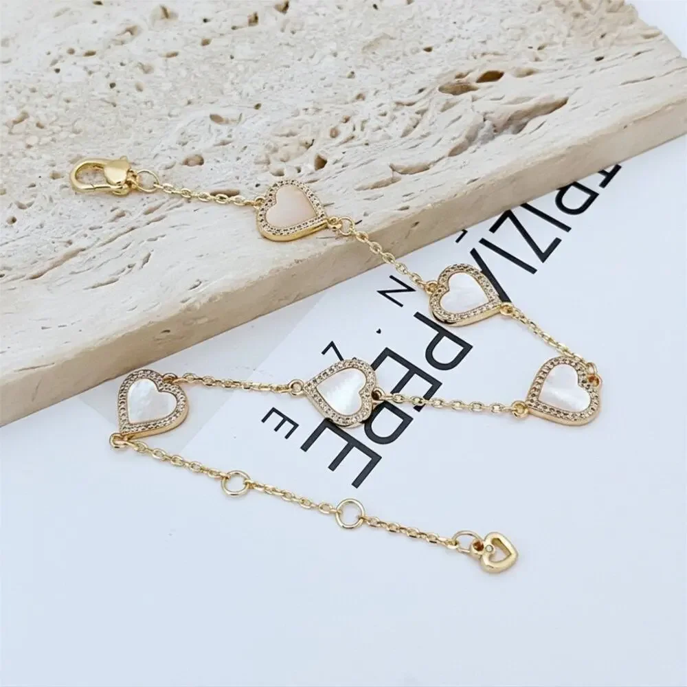 Kate Spade New York Gold-Tone Pavé & Mother-of-Pearl Heart Link Bracelet - Picture 3 of 8